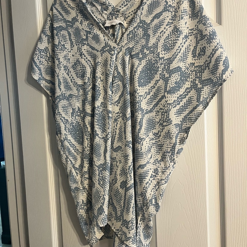 Adrienne Blue and White Asymmetrical Sleeveless Blouse